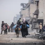 Displaced Palestinians make their way back to their homes in northern Gaza.