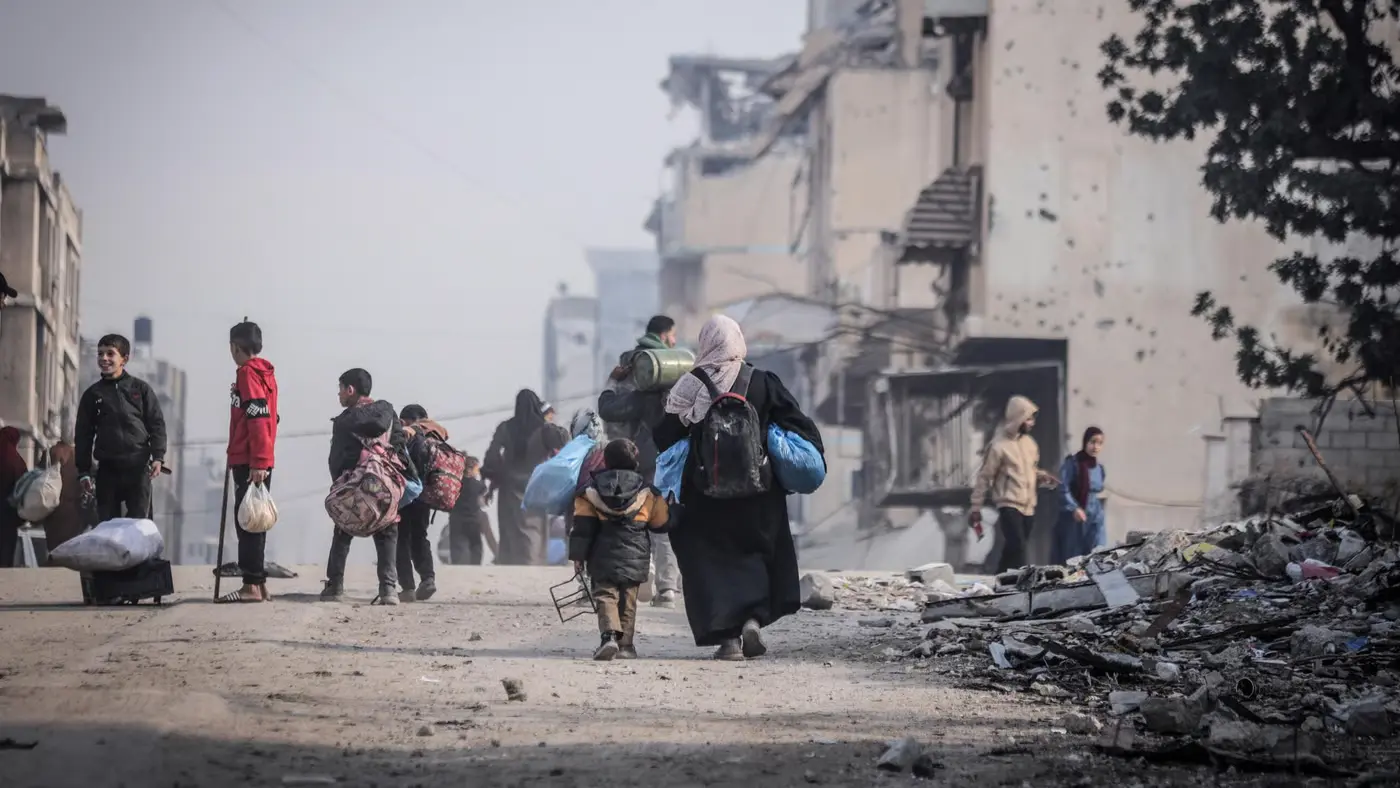 Displaced Palestinians make their way back to their homes in northern Gaza.