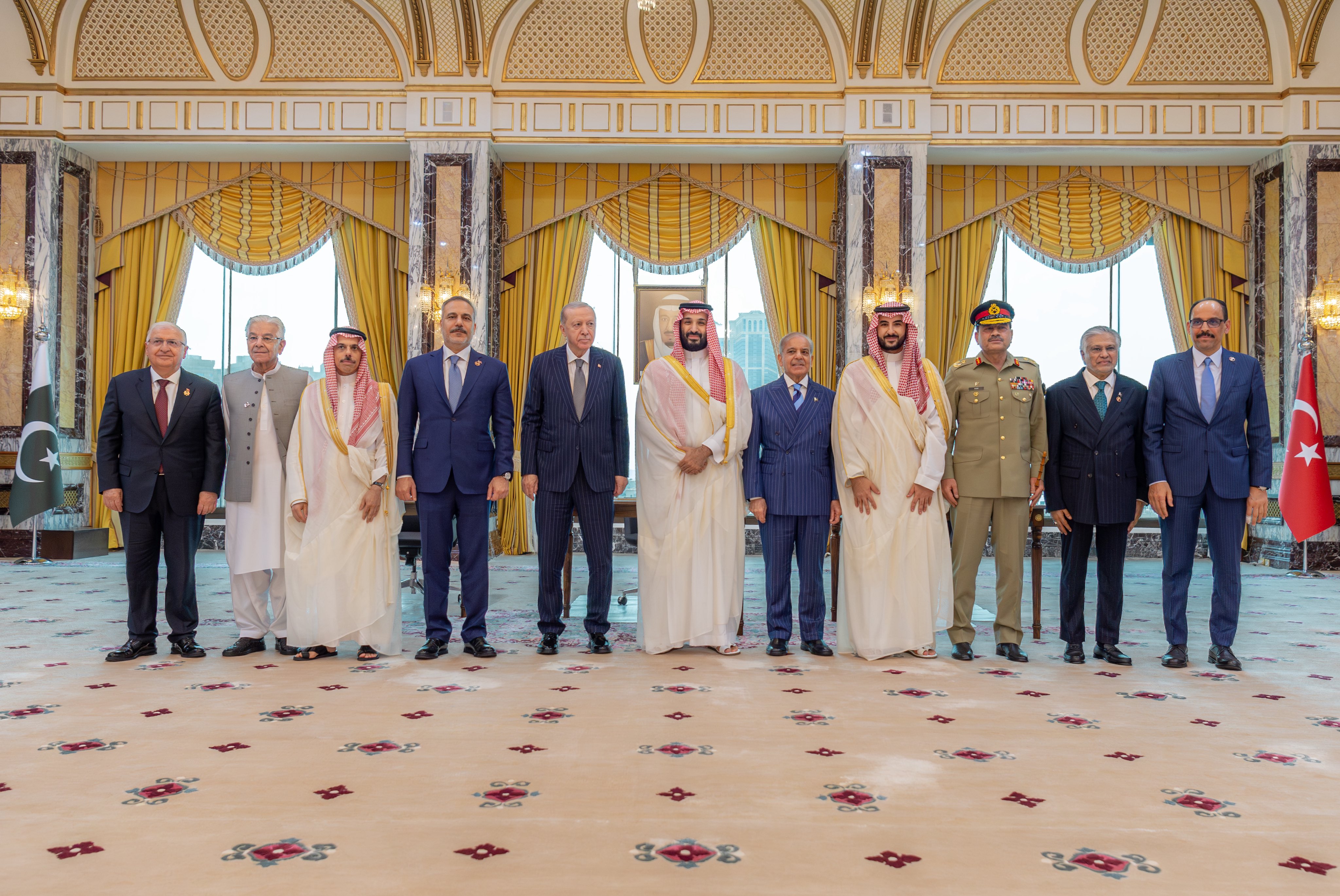 Leaders from Pakistan, Saudi Arabia, and Türkiye pose for a group photograph after signing the Makkah Joint Defense Agreement at Al-Safa Palace, Makkah, 7 August 2026. Source: Pakistan Ministry of Foreign Affairs / Saudi Press Agency.