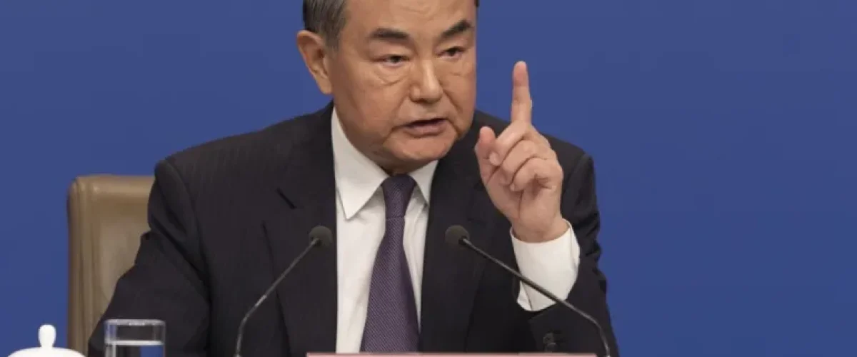 China's Foreign Minister warns of "meeting good with evil" as Beijing vows to "firmly counter" US tariffs amid trade tensions. [Image via EPA]