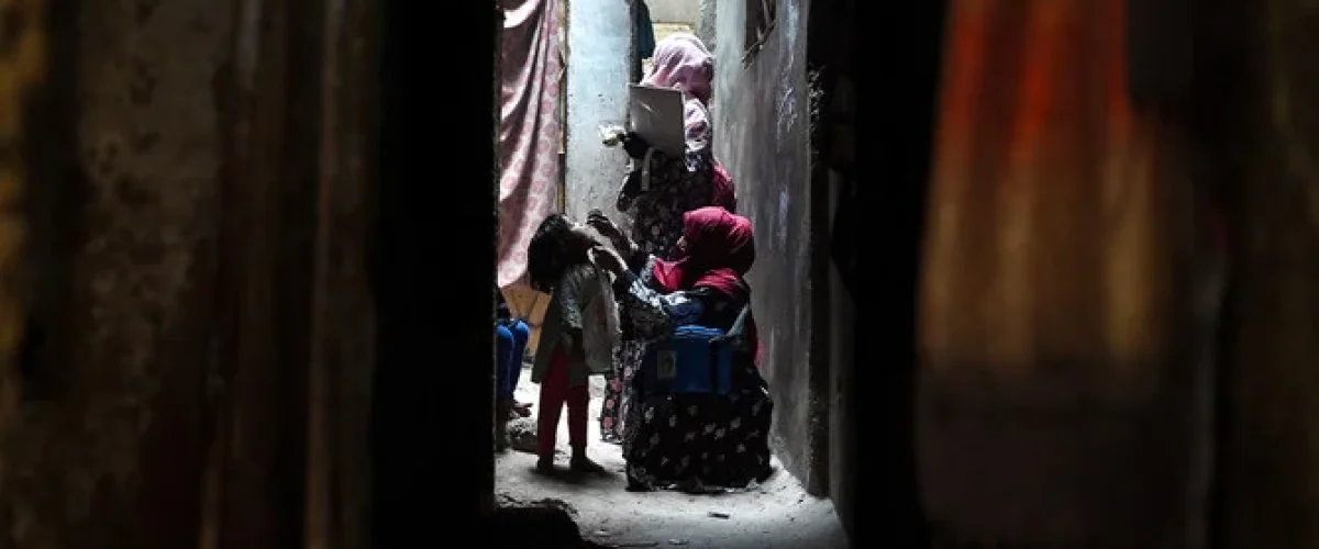 A health worker administers polio vaccine drops during a door-to-door Polio immunisation campaign in Pakistan, June 2024 [Image: Shahzaib Akber EPA-EFE]