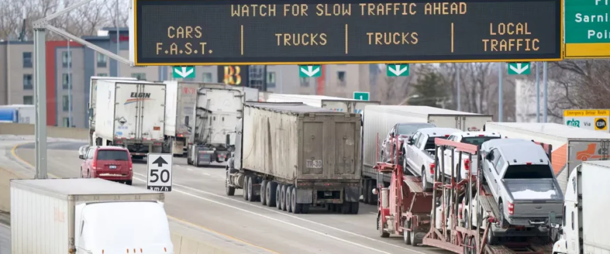 Lutnick says U.S. tariffs on Mexico, Canada may be lower than 25%; trade partners warn of retaliation amid economic concerns. [Image via AFP]