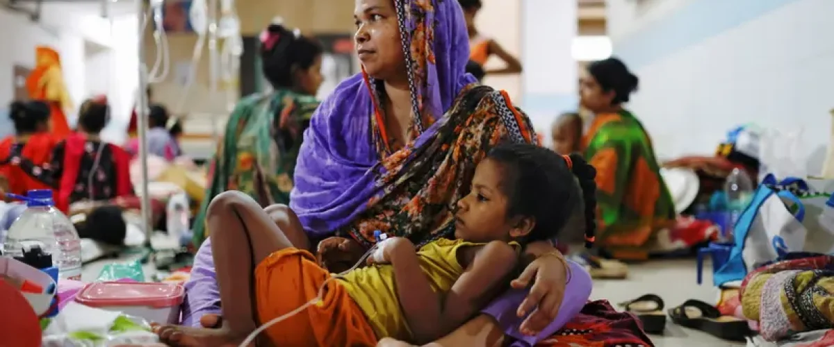 Bangladesh battles its worst dengue outbreak in years, with rising deaths and overwhelmed hospitals caused by climate shifts. [Image via Alarabiya News]