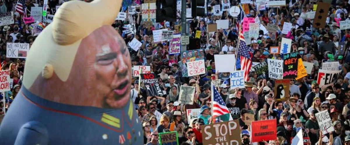 Thousands protest across the U.S. against Trump’s policies, including tariffs, job cuts, and government overhaul efforts. [Image via Reuters]