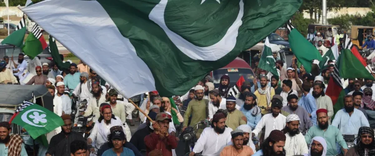 Pakistan jails 25 Imran Khan supporters for attacks on military sites, amid ongoing political unrest and crackdown. [Image via AFP]