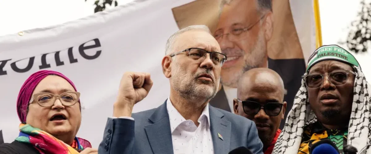 Expelled South African ambassador Ebrahim Rasool returns home to a raucous welcome, defiant over US expulsion and Trump’s stance. [Image via AFP]