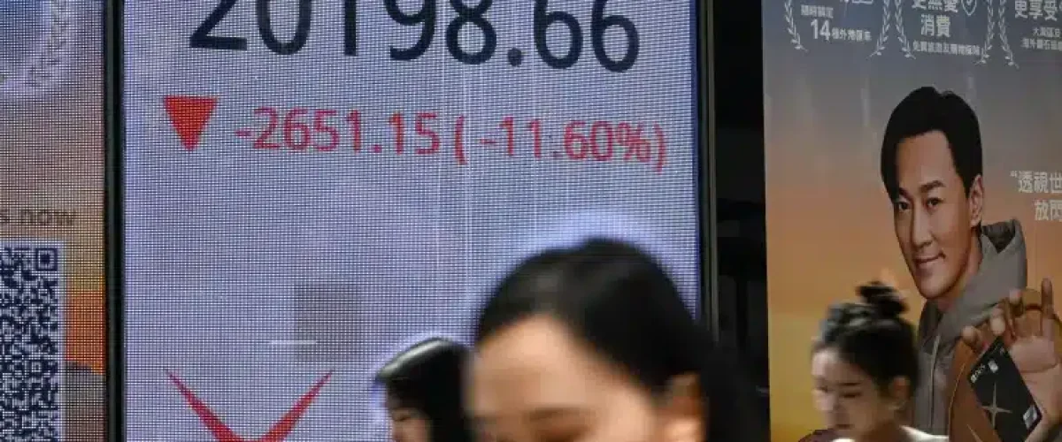 Hong Kong's stock market suffers its steepest drop in nearly 30 years amid panic selling triggered by Trump’s tariff announcements. [Image via AFP]
