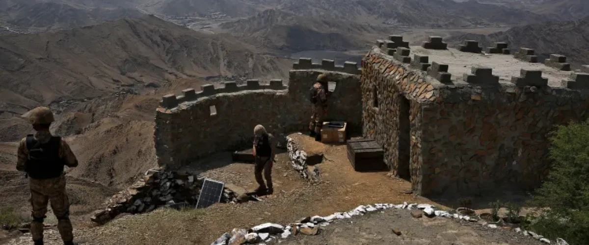Al-Qaeda, TTP, ISKP in Pakistan's backyard: Pakistani troops observe the area from a hilltop post in Khyber district [File: Anjum Naveed/AP]