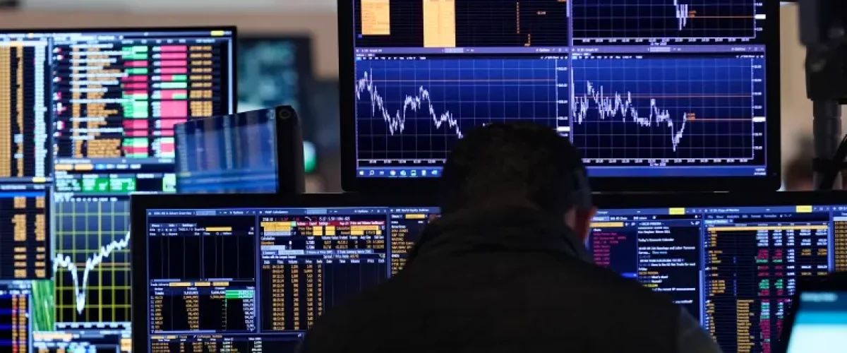 US stocks tumble as Trump threatens steep tariffs on EU wine and alcohol, pushing the S&P 500 into correction territory. [Image via AP]