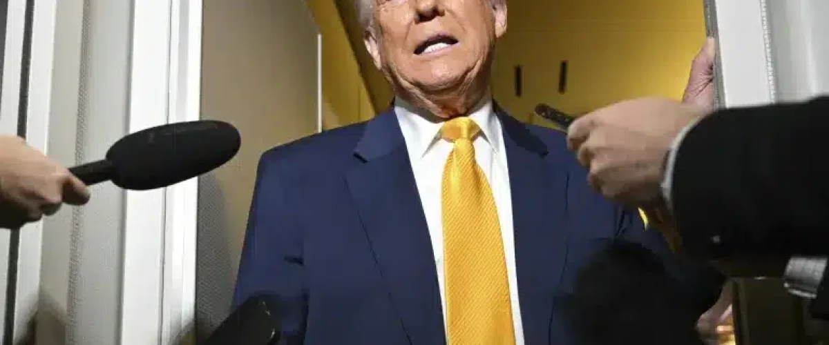 Trump says no one is exempt from tariffs as US-China trade tensions grow despite temporary tech product exemptions. [Image via AP]
