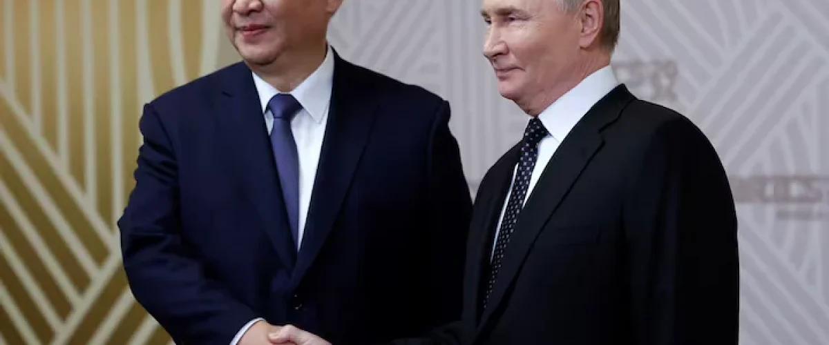 Xi Jinping reaffirms China's "no limits" partnership with Putin, underscoring strong ties amid U.S. diplomatic shifts on Ukraine. [Image via Reuters]