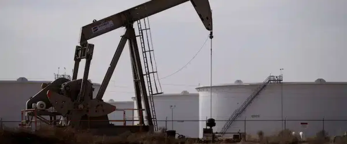 Oil prices hit lows not seen since 2021 amid U.S.-China tariff war and rising supply, sparking global demand concerns. [Image via Reuters/File]