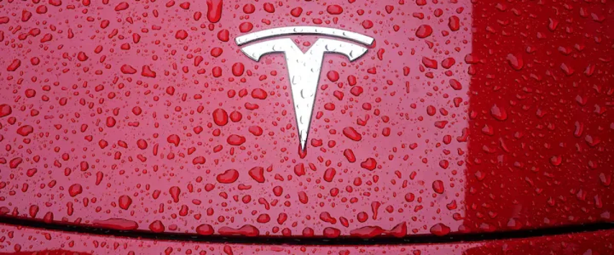 U.S. pushes for zero tariffs on car imports in India, but New Delhi hesitates amid industry concerns and Tesla's entry plans. [Image via Reuters/File]