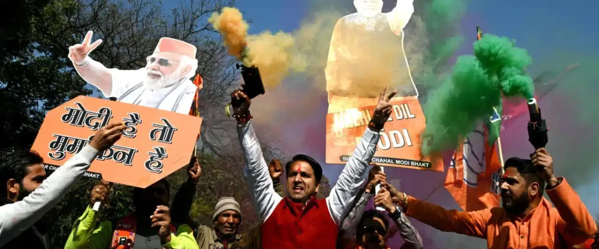 BJP's landslide victory in Delhi 2025 reshapes more than just politics. Is this a dawn of majoritarian era, or a crisis for India's secular fabric? [Image via AFP]