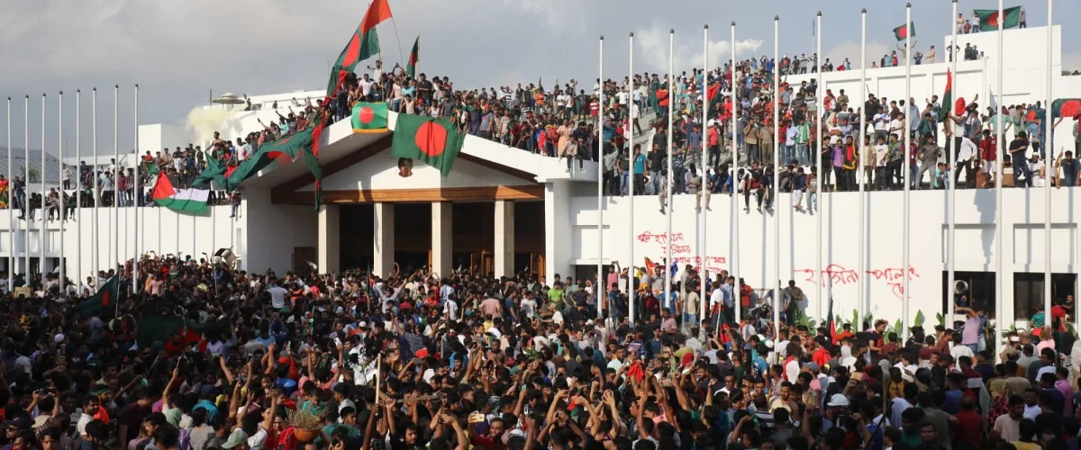 Protesters stormed Prime Minister Hasina's palace in Dhaka after weeks of violent student protests, leading to her resignation on August 5, 2024. [Image/ZUMA Press Wire/dpa].