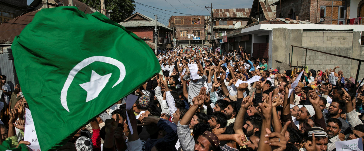 THE ILLEGAL REVOCATION OF ARTICLE 370