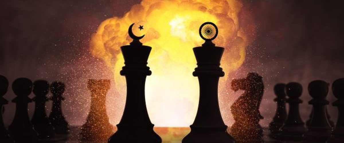 Chess pieces with Pakistan and India symbols face off amid an explosion, symbolizing rising tensions and Pakistan’s full-spectrum diplomacy manoeuvre. [Image via The Diplomat].